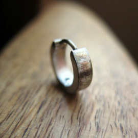 silver hoop earring for men. men's jewelry in brushed stainless steel.